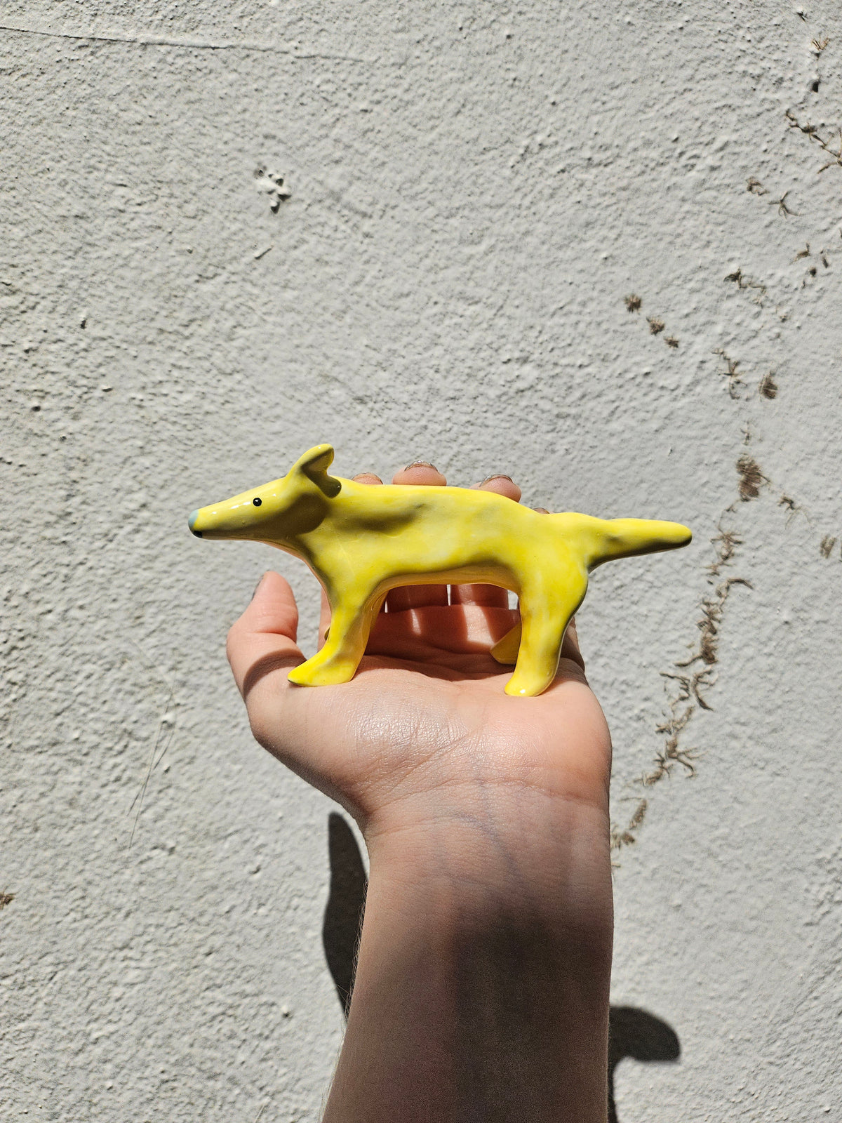 Yellow Ceramic Dog (blue nose) by Louise McFarlane